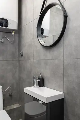 a bathroom with a sink and a mirror at Zyblikiewicza 5- Studio Apartment- Old Town in Kraków