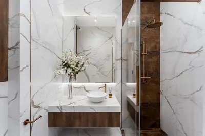 a bathroom with a sink and a mirror at Apartament w sercu Krakowa in Kraków