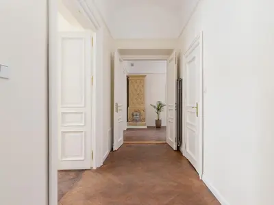 an empty hallway with white walls and white doors at 3 bedroom apartment - Rejtana 10 in Kraków