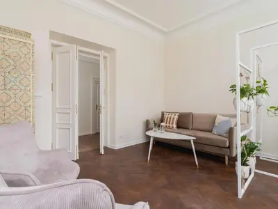 a living room with a couch and a table at 3 bedroom apartment - Rejtana 10 in Kraków