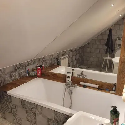 a bathroom with a bath tub and a sink at Dom dla 6 osób in Oświęcim