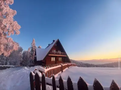 a log cabin in the snow at Domek Pocieszna Podkowa in Rabka-Zdroj
