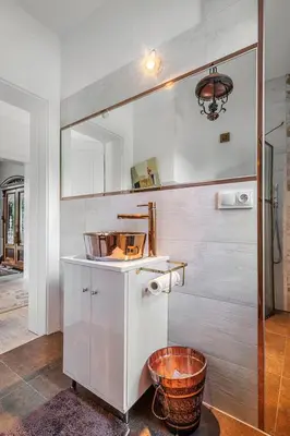 a kitchen with a counter and a basket at Villa Marta in Trzebinia