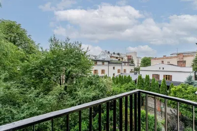 a view from the balcony of a house at Old Town Standard Studio by BookingHost in Kraków