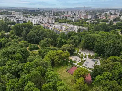 an aerial view of a park with trees and buildings at Lema Apartment near Tauron Arena in Kraków