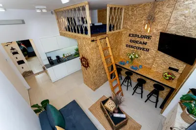 an overhead view of a living room and kitchen in a tiny house at Lighthouse by Cozyplace in Kraków