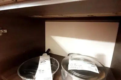two bowls on a counter with price tags on them at Luxury Apartment - Rakowicka R15 in Kraków