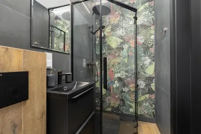 a bathroom with a shower and a sink at Ap with a balcony- Podgorze- Kalwaryjska 34 in Kraków