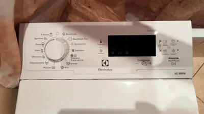 a white microwave with a control panel on top at Apartament Sofia in Kraków