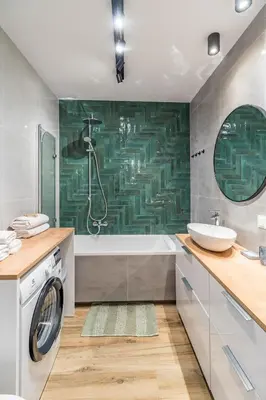 a bathroom with a sink and a washing machine at Kraków Bagry Apt - Parking, Balcony, Workspace - by Rentujemy in Kraków