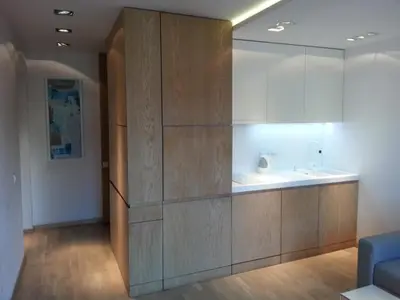 a kitchen with a sink and a cabinet at Modern Studio Apartments Old Town-Kazimierz in Kraków