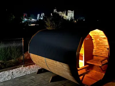 a wooden iguanauanauanauanauanauanauanauanauanauanauanauanauana at Agroturystyka na Jurze Apartamenty z widokiem na Zamek Jacuzzi Sauna Beczka in Ogrodzieniec