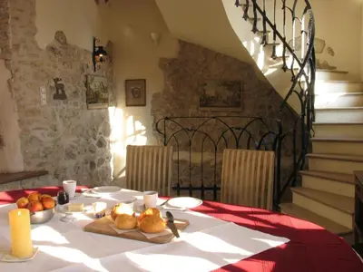 a table with a plate of food on top of it at Zamek Korzkiew in Korzkiew