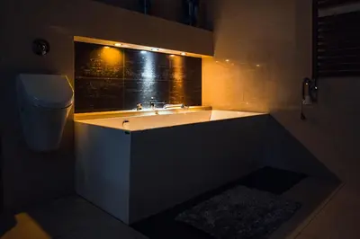 a bathroom with a sink and a toilet at Zagornik in Inwałd