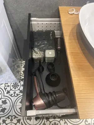 a drawer in a bathroom with a sink at Sunflower Apartment Kalwaryjska Street in Kraków