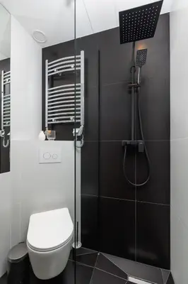 a bathroom with a toilet and a shower at 2-bedroom apartment - Starowiślna 69 street in Kraków