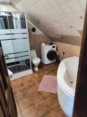 a bathroom with a toilet and a sink and a tub at Dom na wsi w okolicy ENERGYLANDIA ZATOR in Łączany