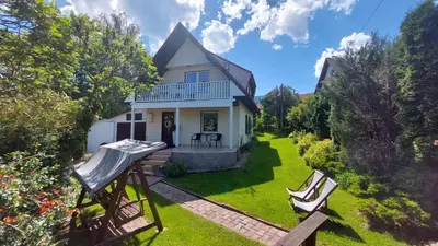 an aerial view of a house with a yard at Cottage Zawoja z Jacuzzi in Zawoja