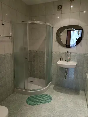 a bathroom with a shower and a sink at apartament blisko Energylandii in Zator