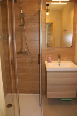 a bathroom with a shower and a sink at Apartment Jerzmanowskiego Krakow in Kraków