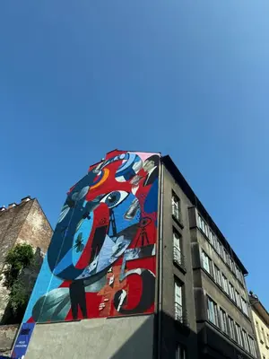a mural on the side of a building at Fine Art Luxury Apartment 110 m2 , 3 min walk to Main Square in Kraków