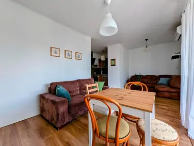 a living room with a table and a couch at Dworska 1B by Homeprime in Kraków