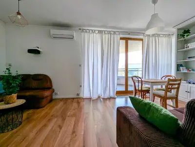 a living room with a couch and a table at Dworska 1B by Homeprime in Kraków