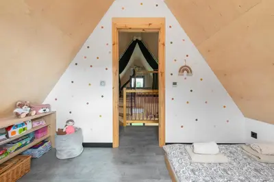 a childs room with a climbing wall at Casa Dobra in Dobra
