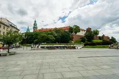 a large plaza in a city with buildings at Dodo Acomodo 6 in Kraków
