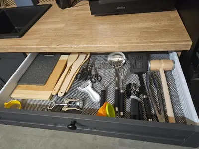 a drawer filled with tools on a table at Domek Pod Skarpą in Wieprzec