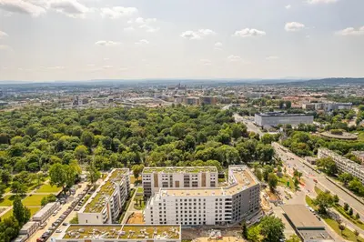 an aerial view of a city with buildings and trees at Kraków Old Town - Bus&Tram Stops Nearby, Balcony - by Rentujemy in Kraków