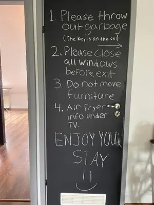 a chalkboard door with writing on it at Piekny,duzy loft 80 metrow blisko centrum in Kraków