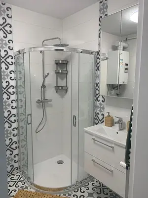 a bathroom with a shower and a sink at Smile 2 in Tomice