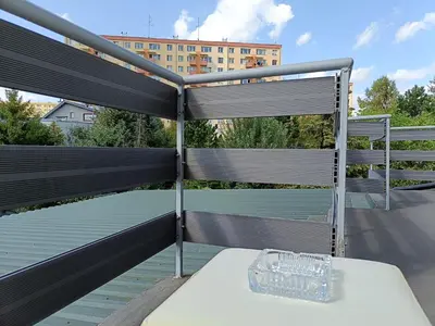 a plastic bottle sitting on a table on a roof at pokoje przytulnie jak w domu in Kraków