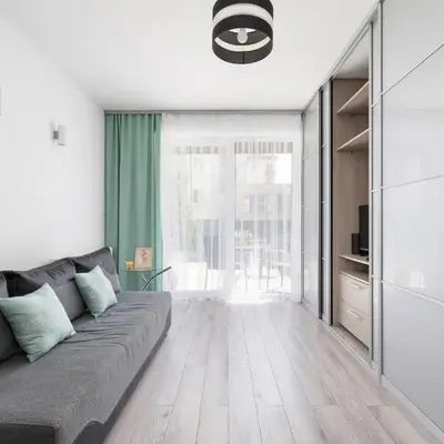 Apartament w Spokojnej Okolicy z Parkingiem by Noclegi Renters