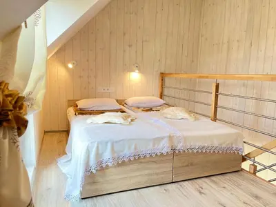a bedroom with two beds in a room at Apartamenty Artur in Oświęcim