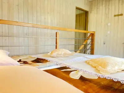 a bedroom with two beds with white linens at Apartamenty Artur in Oświęcim