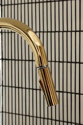 a gold faucet on a bathroom sink at Comfort Central Studio - by Upstairs in Kraków