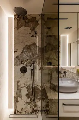 a bathroom with a shower and a sink at Boutique Wawel Side in Kraków