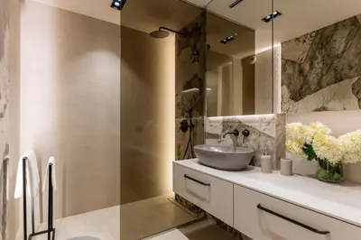 a bathroom with a sink and a mirror at Boutique Wawel Side in Kraków