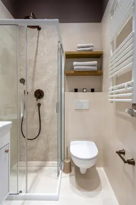 a bathroom with a shower and a toilet at Studio apartment - Starowiślna 41 street in Kraków