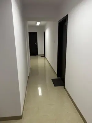 a bathroom with a toilet and a sink and a shower at Krakstop apartamenty in Kraków
