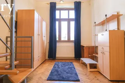 a living room with a refrigerator and a window at Big cozy apartment Free 1 parking in Kraków