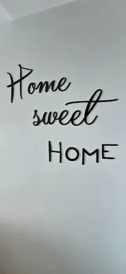 a handwritten sign that reads home sweet home at Apartament nad Wisłą in Kraków