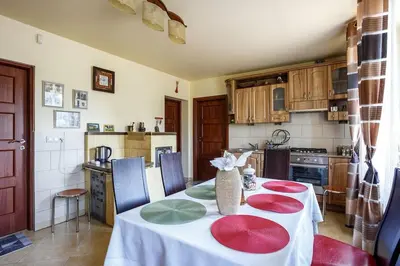 a living room with a couch and chairs and a table at Oaza Wysoka powiat wadowicki in Wysoka