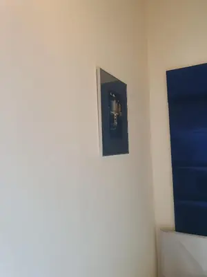 a picture hanging on a wall in a room at Szymborska Stradomska 5 in Kraków