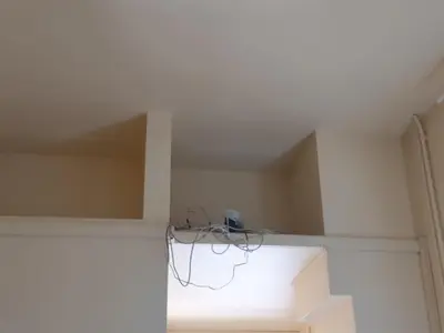 a room with white walls and a white ceiling at Szymborska Stradomska 5 in Kraków