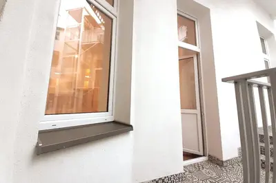 a window on the side of a building at Bosacka Street - Apartament B26 in Kraków