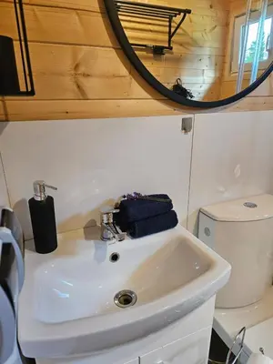 a small bathroom with a toilet and a shower at Lavendowa oaza in Kocierz Rychwałdzki