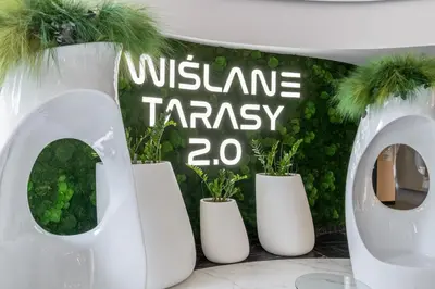 a group of white vases with plants in them at Wiślane Tarasy 2 0 Blue Studio by BookingHost in Kraków